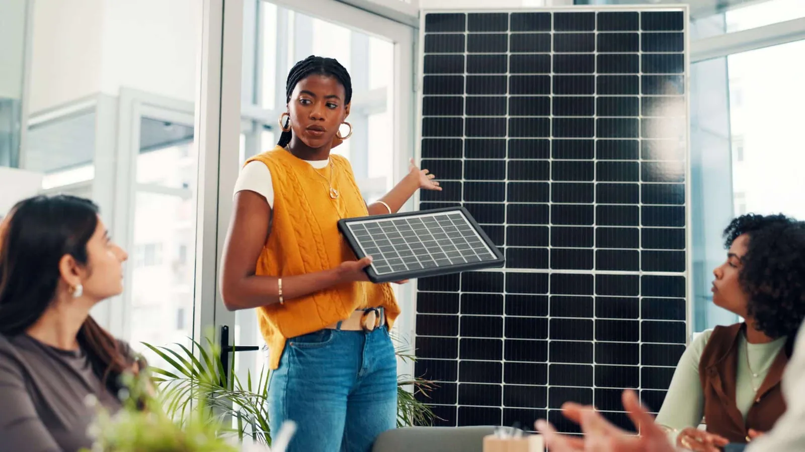 SOLINK project photograph: solink solar installer presenting panel to business clients